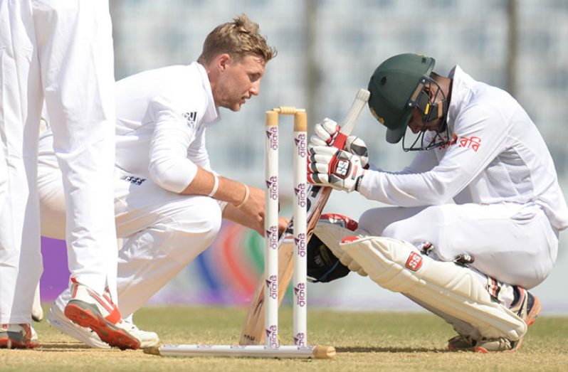 Joe Root consoles Sabbir Rahman after a heartbreaking loss for the hosts in the first Test in Chittagong.