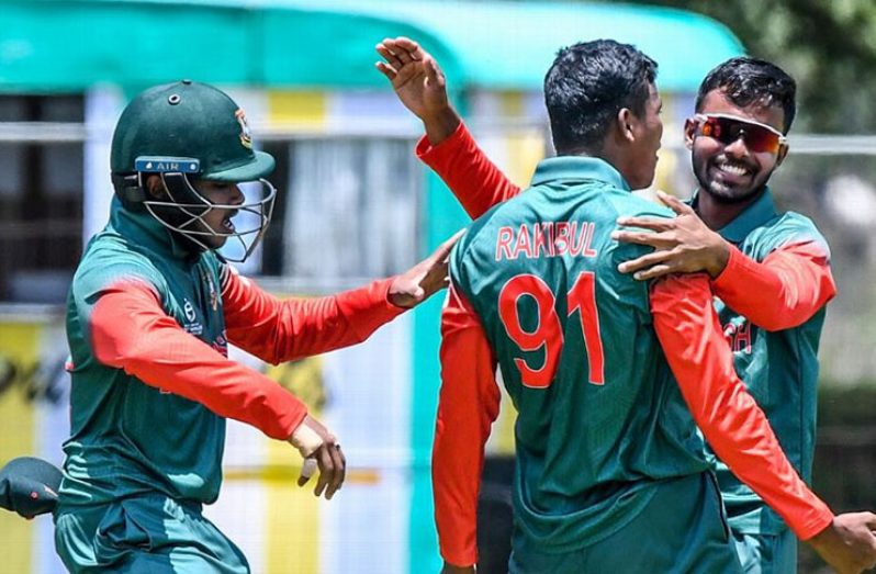 Rakibul Hasan celebrates a wicket. (ICC via Getty Images)