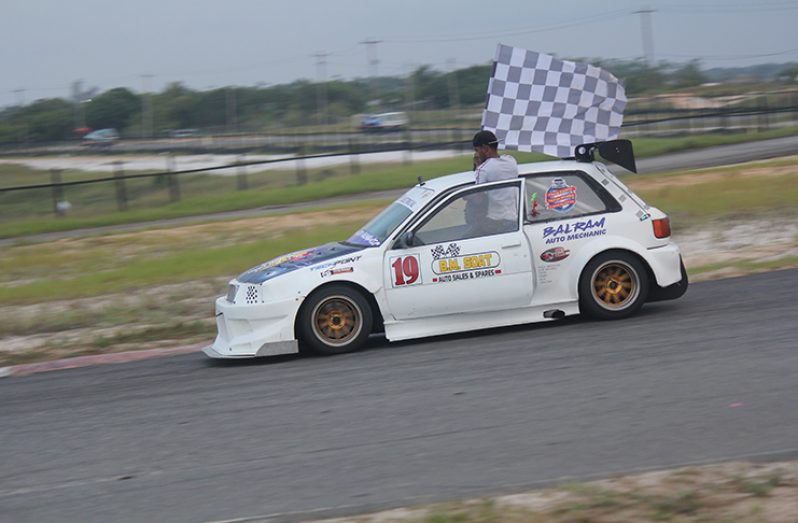 Rameez Mohamed displays his chequered flag (GTRidez Photo)