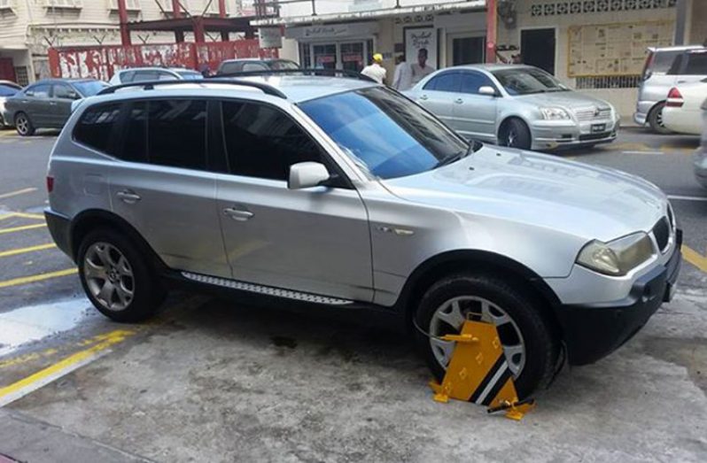 A team of officials from Smart City Solutions clamped the wheels of the vehicle belonging to former President, Donald Ramotar