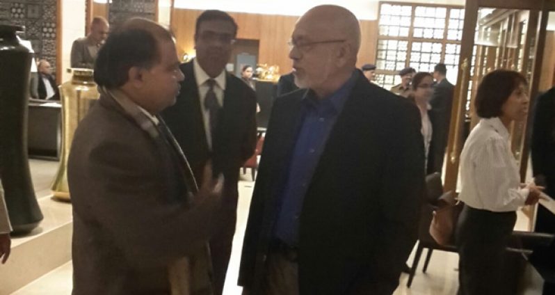 Former President Donald Ramotar in discussion about the Specialty Hospital with Fedders-Lloyd representative Ajay Jha, during a trip to India in January of this year.