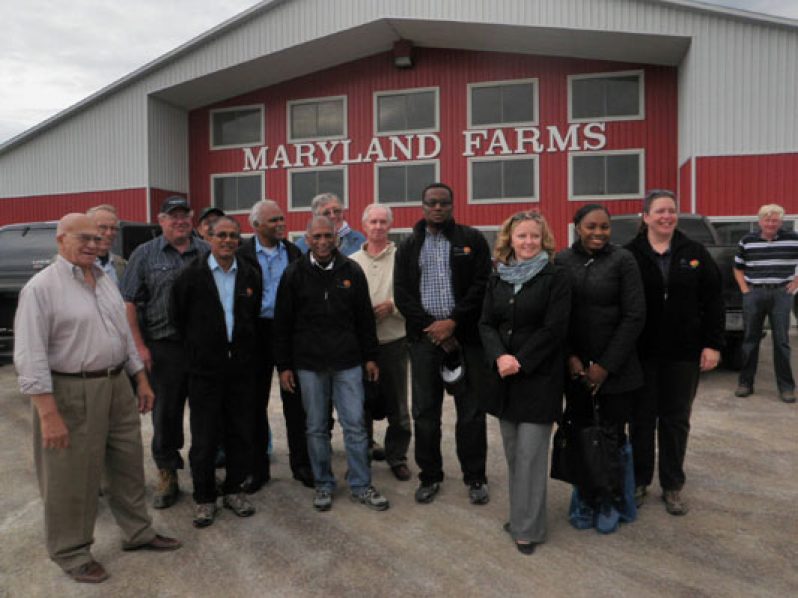 ‘Minister Ramsammy tours Maryland Dairy Farm’: In photo, from left, are Jose Gonzales, Jim Callahan, Dr. Dindyal Permaul, Dr. Doobay, Minister Leslie Ramsammy, Lloyd Wicks, Richard Ross, Shannon McCarthy, Nicole Johnson and Kelly Maloney