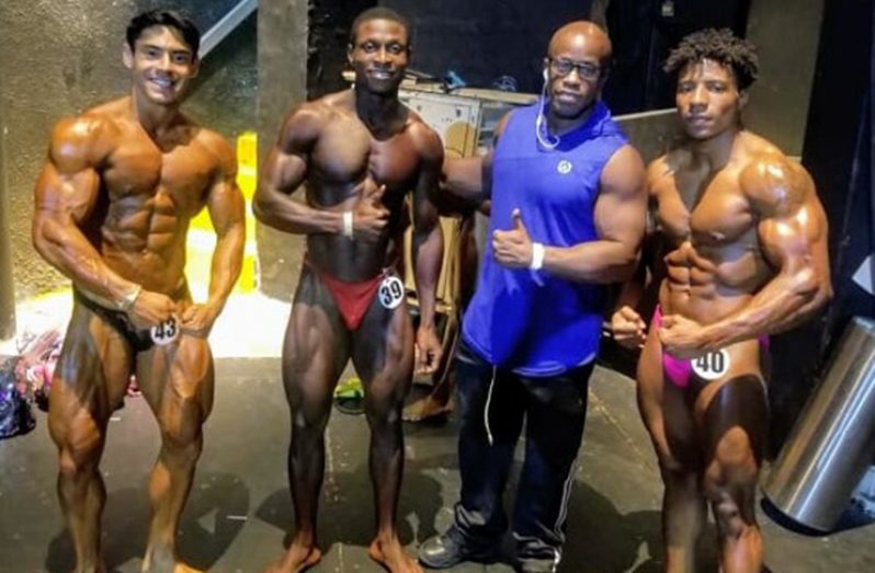 Guyanese Darius Ramsammy (right) with a few of his opponents yesterday in the Dominican Republic.