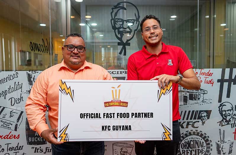 FL Sport’s John Ramsingh (left) and KFC Guyana’s Business Analyst, Johnathan Milford