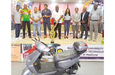 (from left) Inderjeet Persaud (MC), Anil Hardyal, John Ramsingh, Ershad Mahamad (Guydrones), Prime Minister Mark Phillps, Telesha Ousman (GSCL President), Dr Jinendra Singh and Ian John at yesterday’s launch at MYO (Sean Devers photo)