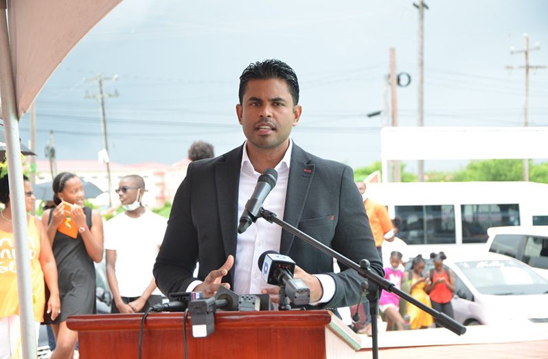 Minister of Culture, Youth and Sport, Charles Ramson Jr. delivering his address at the commencement of the Teach Them Young swim camp.