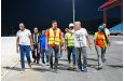 Minister Charles Ramson Jr. (centre) and Minister Steven Jacobs (far left) lead the inspection team at the synthetic track
