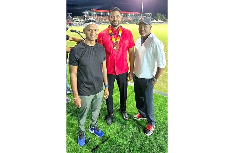 Minister Charles Ramson is flanked by Shiv Chanderpaul and Brian Lara