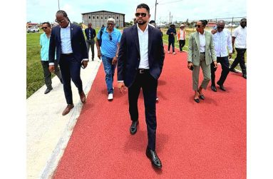 Minister of Culture, Youth and Sports Charles Ramson Jnr along with Minister Within the Ministry Steven Jacobs, National Sport Commission and other officials tour the Leonora Track and Field facility.