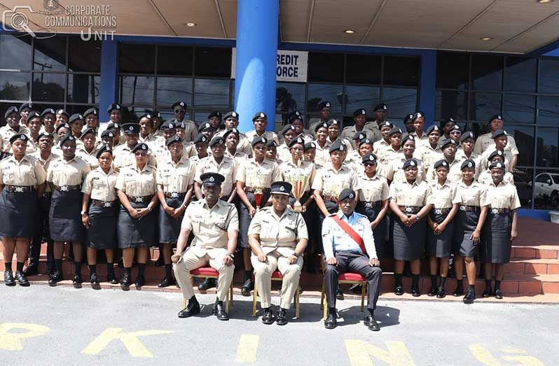 Director of the Academy, Woman Superintendent Sonia Herbert (seated at centre) flanked by Special Constabulary Assistant Superintendent, Wallace and Course Coordinator, Sergeant Christie, with ranks that graduated