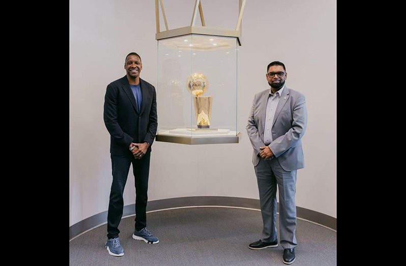 President Irfaan Ali and Masai Michael Ujiri in front of the Larry O’Brien Championship Trophy, which was won in 2019 by the Raptors