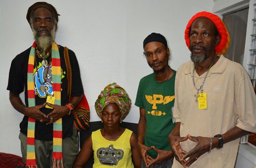 High-ranking members of the local Rastafarian community. They are, from left: GRC Head, Ras Simeon; Secretary of the Guyana Reparations Committee, Ms Woziero Esther Gittens; GRC Treasurer, Ras Richard Taylor; and Twelve Tribes of Israel Overseer, Ras Percy Bristol