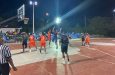 Defending champions Ravens  (in orange) battling Mambas in
(black) in the  league opener.