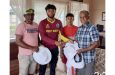 Rawana, Rampertab and Rampersaud Ramnauth and Kamal pose with some of the items