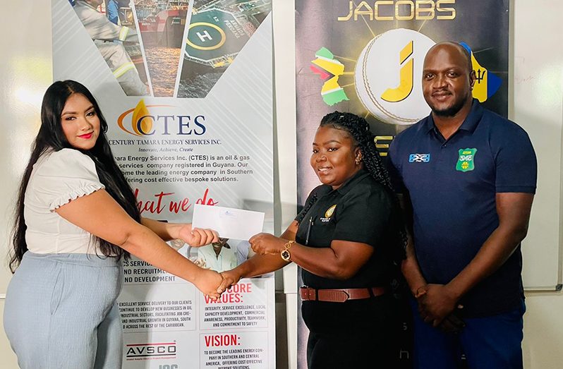 CTES Business Development Officer, Varshnie Rampersaud (left), hands over the sponsorship cheque to RT 3x3 Classic’s team member, Bianca Marques, in the presence of Organiser, Rawle Toney.