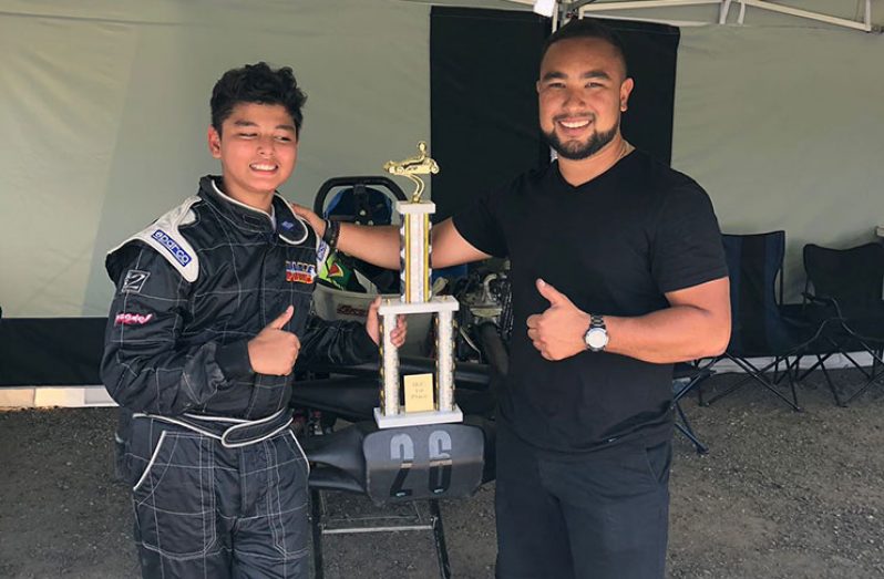 Rayden Persaud (right) stands with his team member Stefan Jeffrey