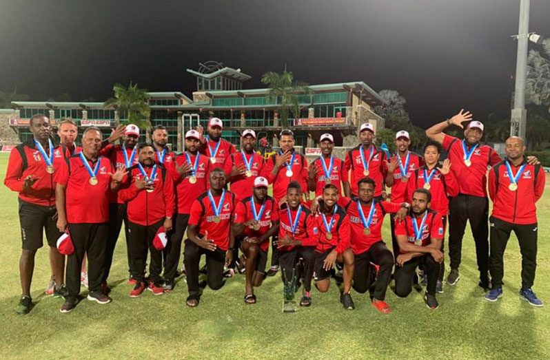 The successful T&T Red Force unit celebrate with the Sir Clive Lloyd Trophy (Photo: CWI Media)