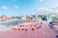 Tuesday afternoon saw the Kitty Seawall Esplanade covered in a captivating display of red shoes, a collaborative event aimed at highlighting the issue and long-lasting impact of gender-based violence