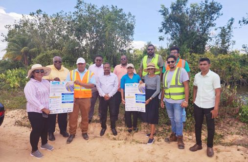 The Regional Chairman for Region Two, Vilma De Silva, representatives from GUYSOL and regional officials at the solar farm site at Charity