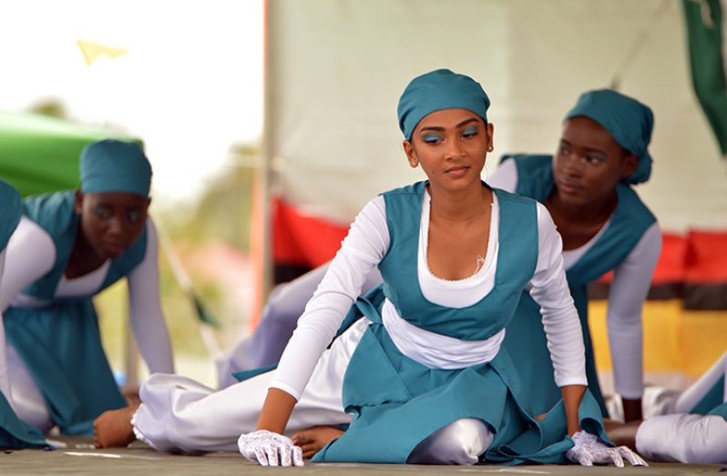 Students performing a devotional dance