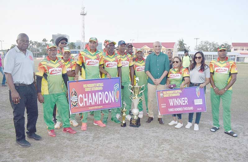 Flashback: The victorious Regal Legends players pose with Vice-president Dr Bharrat Jagdeo following their victory in last year’s final.
