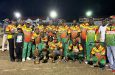 The victorious Regal Legends players and supporters pose with their winnings
