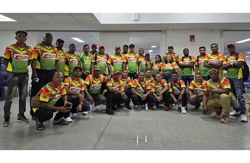 The Regal players and officials pose for a picture opportunity shortly before their departure for the ‘Big Apple’