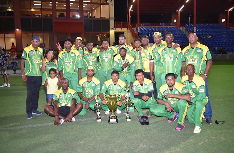 The winning Regal All Stars team with supporters after they won the title.