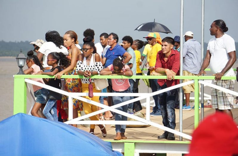 Onlookers of the boat races at the Bartica Regatta