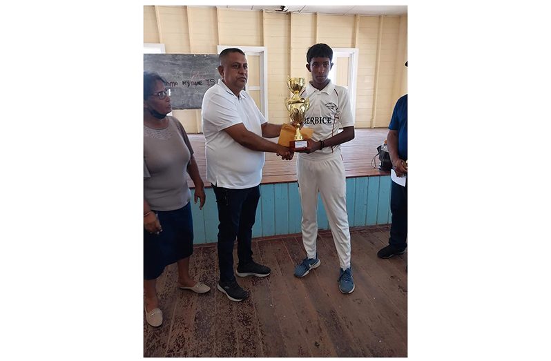 Region 6. Vice Chairman Zamal Hussain hands over the winner’s trophy to the Albion captain, Farhan Balle