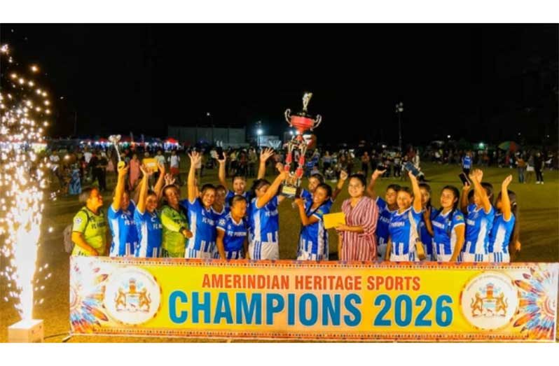 Region Seven female football champions after collecting the winning trophy from the Minister of Amerindian Affairs Hon. Sarah Browne-Shadeek
