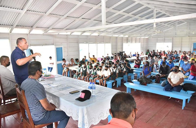 Minister of Housing and Water Collin Croal addressing the gathering at Waramadong on Sunday