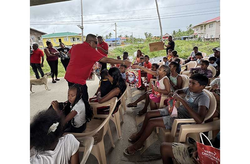 Member of Parliament, Zamal Hussain, together with Regional Chairman, Junior Basant, distributed toys to youngsters across communities from Hampshire, Corentyne to Sheet Anchor, East Canje, Berbice