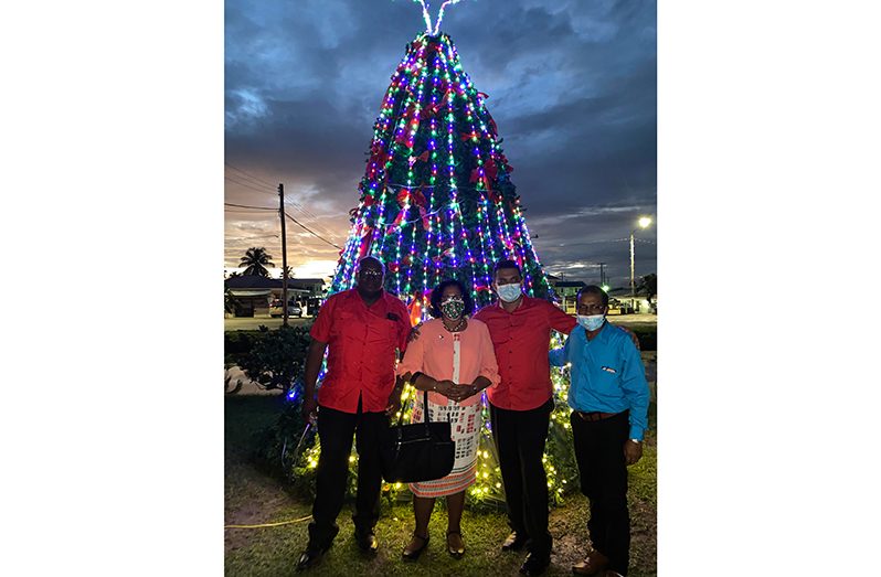 Regional Chairperson, Vilma De Silva; Regional Executive Officer, Devanand Ramdatt; Regional Vice Chairman, Humace Odit, and Arnold Adams who represented the Prime Minister, at the light-up