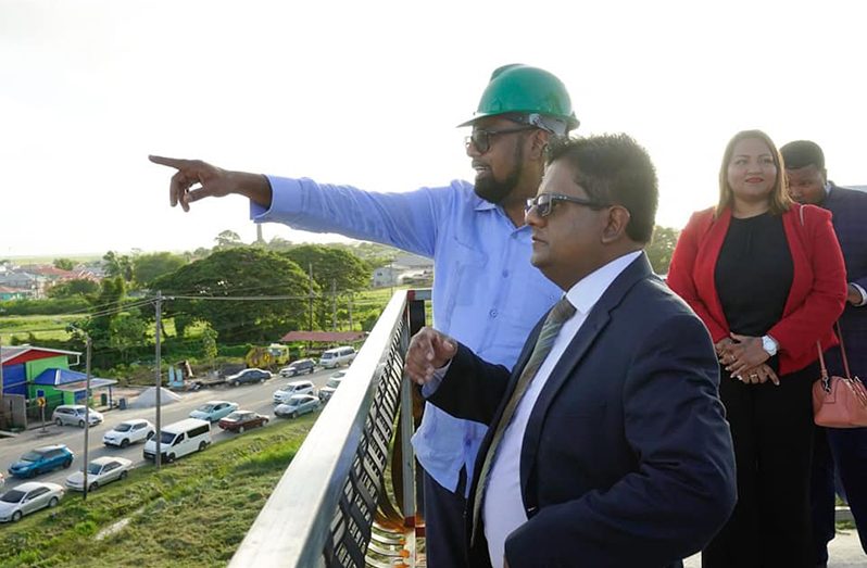 President, Dr Irfaan Ali and Senior Minister in the Office of the President with responsibility for Finance, Dr Ashni Singh, in conversation during a tour of the Sheriff Hospital and the West Central Mall, Region Three, on Friday (Office of the President photo)