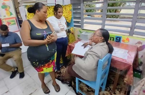 Regional Education Officer Shondelle Hercules talking to parents