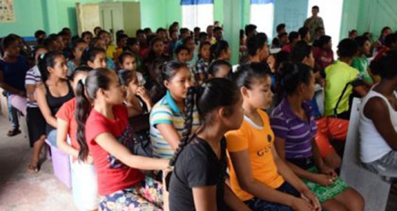 A section of the gathering in Moruca, Region One during the consultations of the Commission of Inquiry into the state of the education system