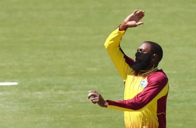 Left-armer Raymon Reifer sends down a delivery during his three-wicket spell. (Photo courtesy CWI Media)