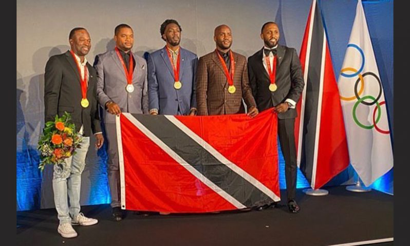 Trinidad and Tobago's men's 2008 4x100 Olympic team collected their gold medals from IOC president Thomas Bach at a reallocation medal ceremony in Switzerland yesterday Photo: Naaatt Facebook Page