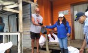 Minister of Amerindian Affairs, Pauline Sukhai distributes flood-relief hampers to Region Eight residents (DPI photo)
