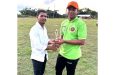 Man-of-Match Renaldo Jeffery and was presented with his trophy by Yusuf Khan.