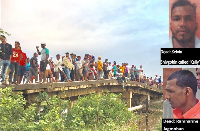 Residents take to the Johanna Black Bush Polder Bridge to get a better view of