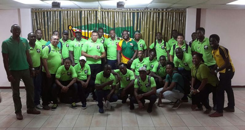 The victorious “Green Machine”team pose for a picture on return home (Delano Williams photo)