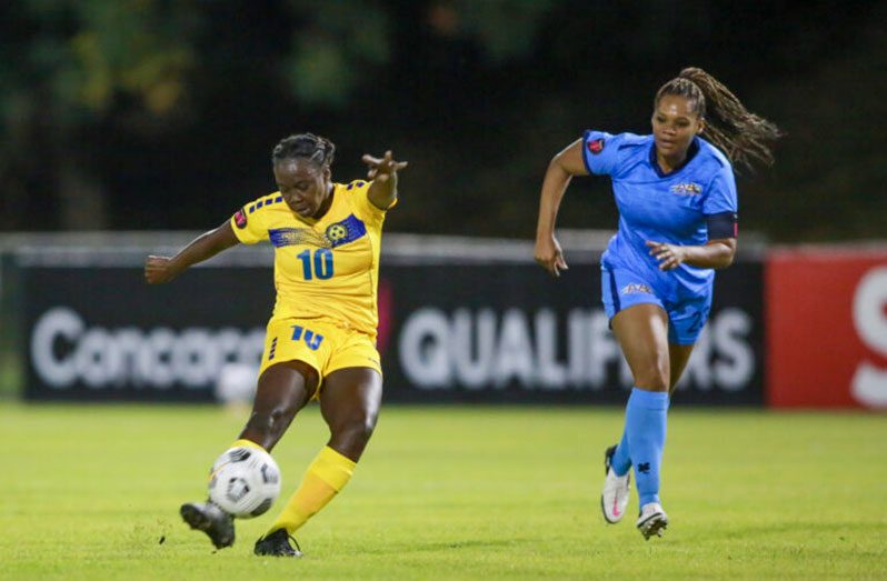 Rianna Cyrus of Barbados takes a shot during the match against Aruba. (Photo: CONCACAF/Straffon, Images, Miguel/Gutierrez