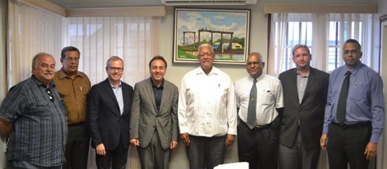 Minister Noel Holder with Mr Bruno Sempio (left of minister) and other officials at the meeting