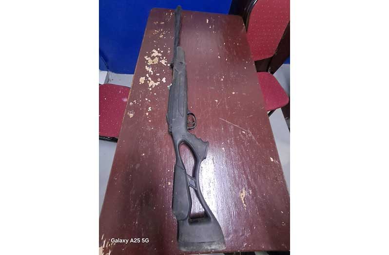 The suspected firearm found concealed in a salt bag beneath the counter of a barber shop at Sea Dam, Crabwood Creek