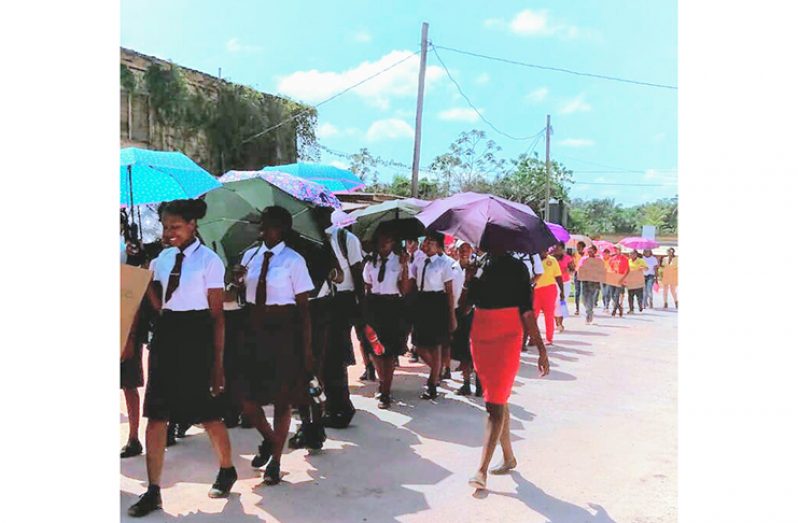 Students of Kwakwani Primary and Secondary Schools as they participate in the ‘Break the Silence’ Rally held in Kwakwani on Thursday