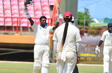 Congratulations Jhonny Ringo! Guyana Jaguars’’ Narsingh Deonarine salutes his teammates after chalking up his 10th first class ton yesterday at the Guyana National Stadium against the Leeward Islands. (Photo by Adrian Narine)