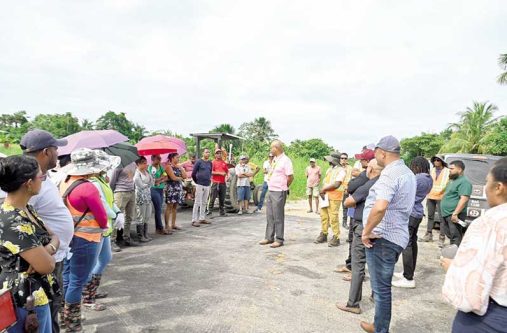 The Minister of Public Works, Bishop Juan Edghill, engages  residents of Bendorff to discuss the Maripa Access Road project on the East Bank of Essequibo.