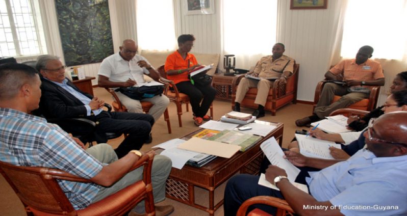 Members of the National Road Safety Council in talks yesterday with Education Minister, Dr Rupert Roopnaraine (second left) at his office
